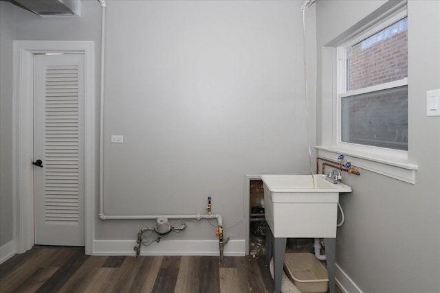 bathroom with hardwood / wood-style flooring