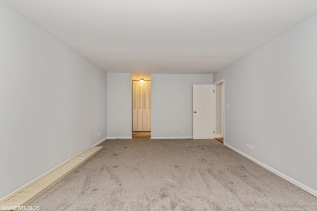 spare room with light colored carpet