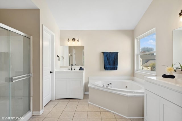 bathroom featuring separate shower and tub, tile patterned flooring, vanity, and vaulted ceiling