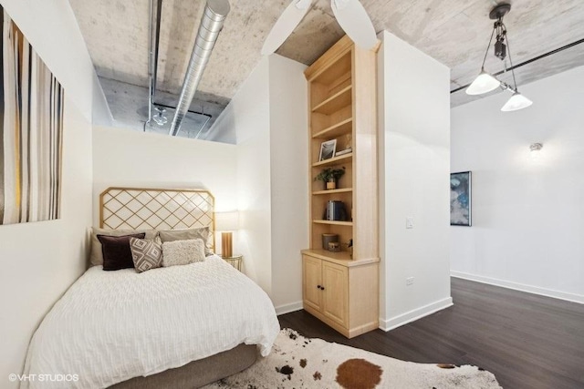 bedroom featuring dark wood-type flooring