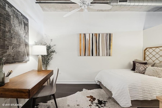 bedroom featuring dark wood-type flooring and ceiling fan