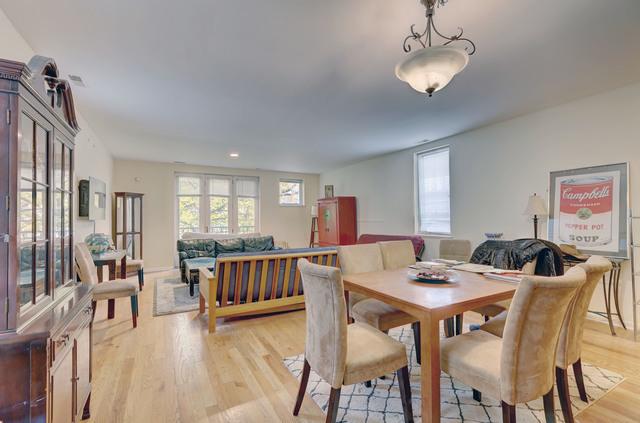 dining area featuring light wood-type flooring