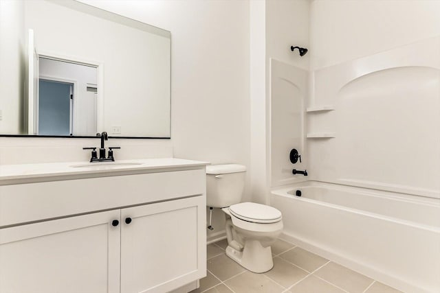 full bathroom with tile patterned flooring, shower / tub combination, vanity, and toilet