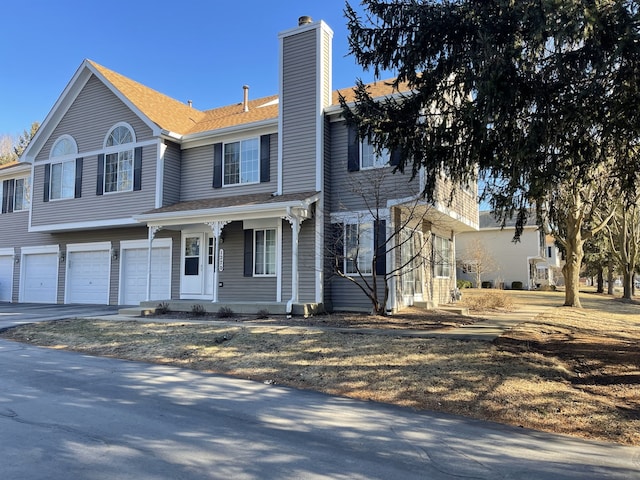 view of front of property featuring a garage