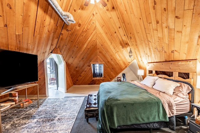 bedroom featuring wood ceiling, vaulted ceiling, and wood walls