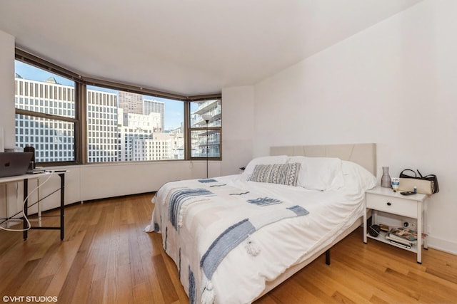 bedroom featuring hardwood / wood-style flooring