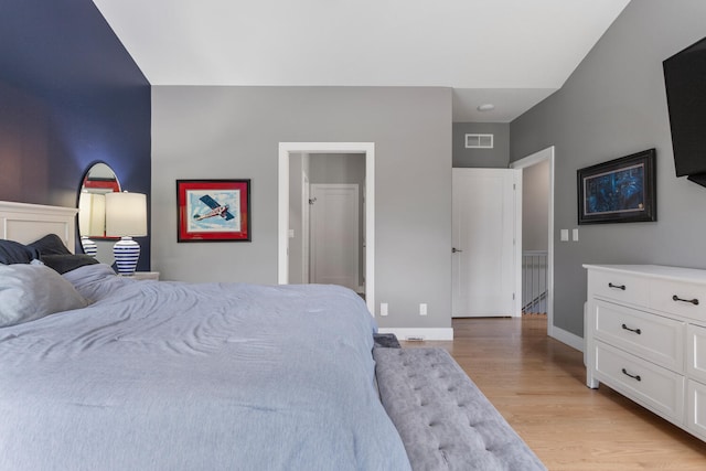 bedroom featuring light wood-type flooring