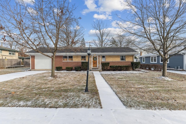 single story home featuring a garage