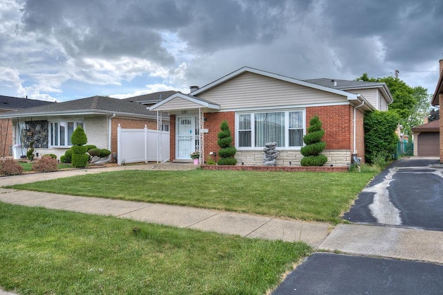 view of front of home with a front lawn