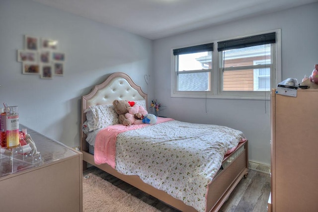 bedroom with light hardwood / wood-style flooring