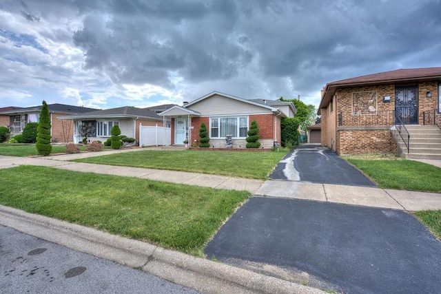 view of front of home with a front lawn