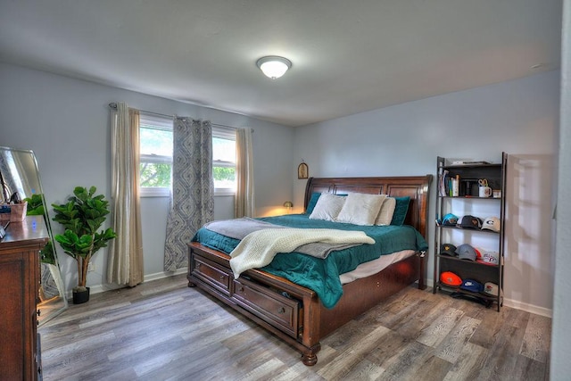 bedroom featuring light hardwood / wood-style flooring