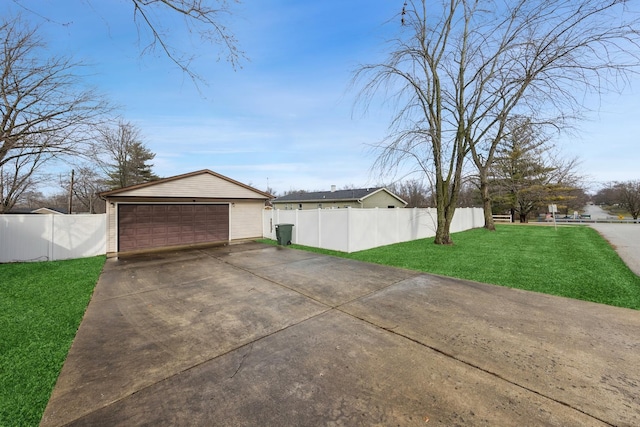 view of property exterior featuring a yard and a garage