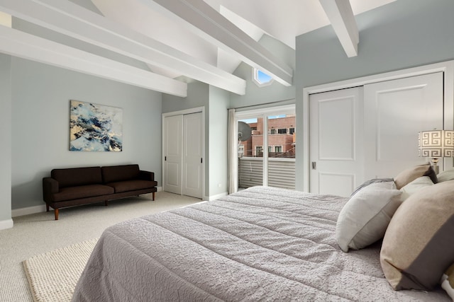 bedroom with multiple closets, carpet, beam ceiling, and access to exterior