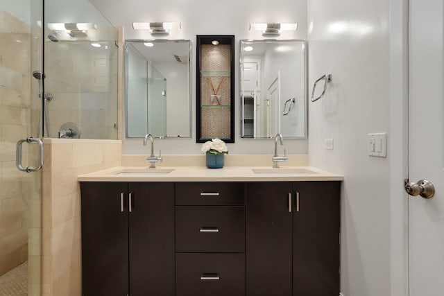 bathroom with vanity and walk in shower