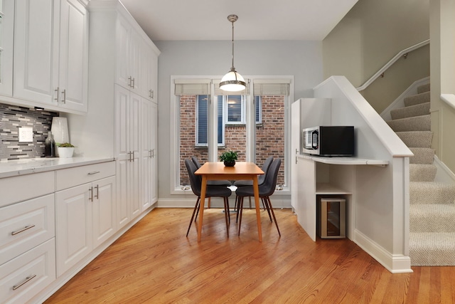 dining room featuring light wood-type flooring