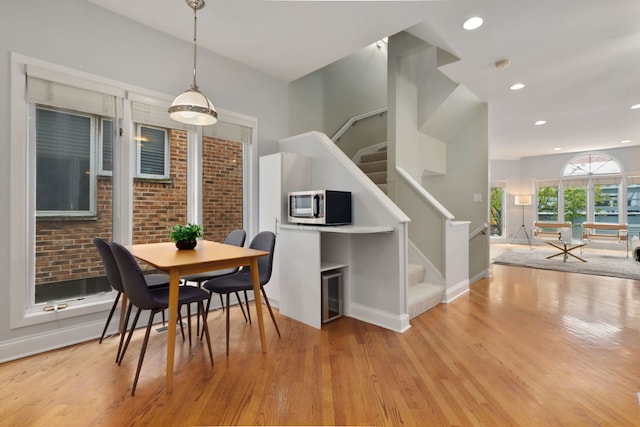 dining room with light hardwood / wood-style floors