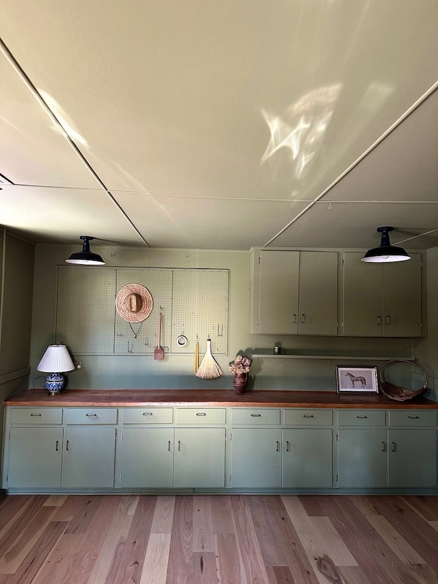 kitchen with butcher block counters and light wood-type flooring