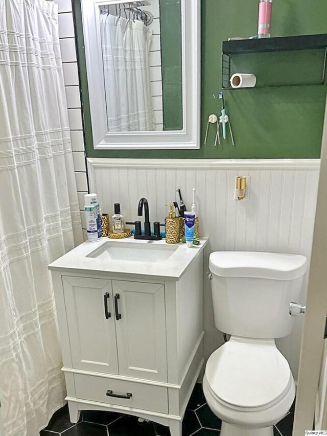 2433 Cedar Creek Ct, Quincy, IL 62305 - bathroom featuring tile patterned flooring, vanity, and toilet