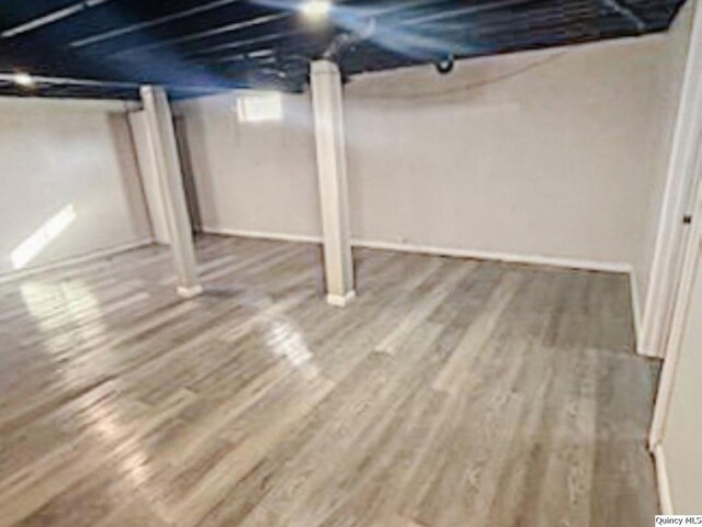 2433 Cedar Creek Ct, Quincy, IL 62305 - basement featuring wood-type flooring