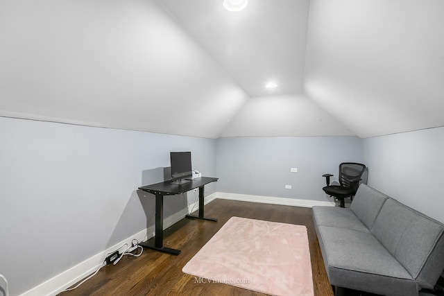 office area with dark hardwood / wood-style flooring and lofted ceiling