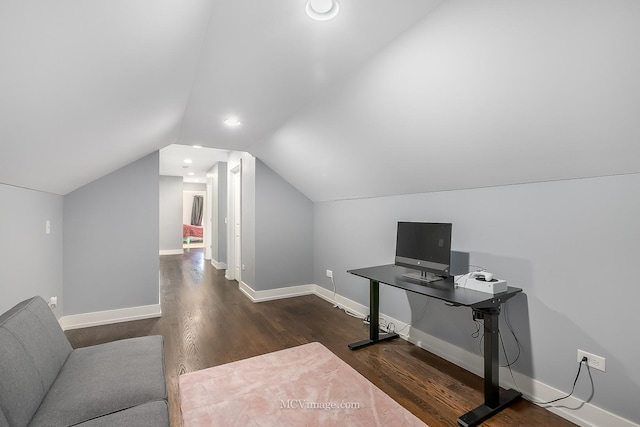 office space with dark hardwood / wood-style floors and lofted ceiling