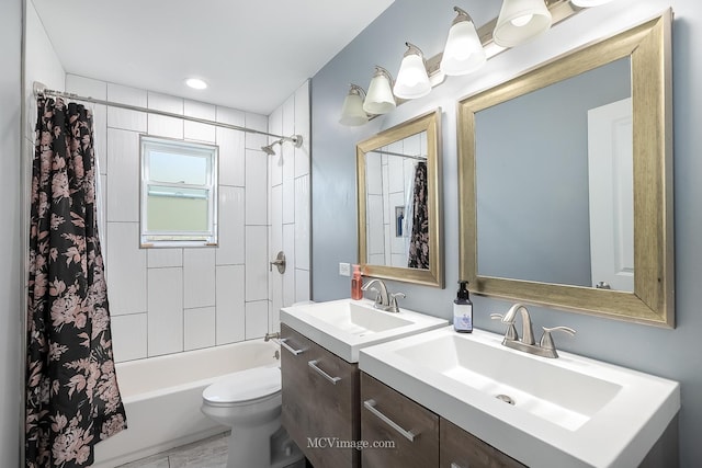 full bathroom featuring vanity, toilet, and shower / bathtub combination with curtain