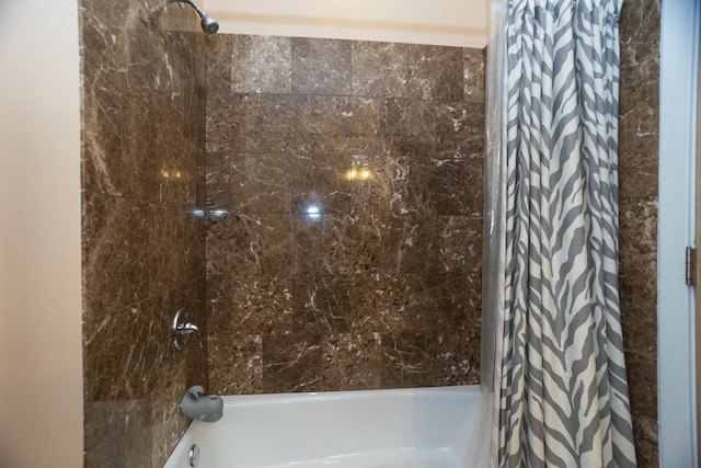 bathroom with shower / bathtub combination with curtain