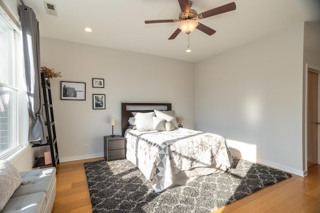 bedroom featuring ceiling fan and light wood-type flooring