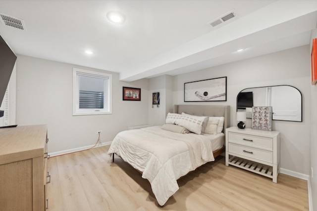 bedroom featuring light wood-type flooring