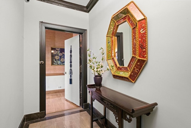 hallway with crown molding