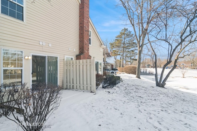 view of snow covered property