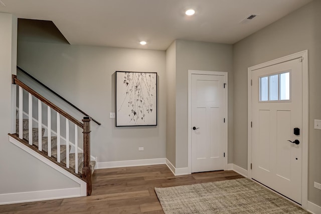 foyer with hardwood / wood-style floors