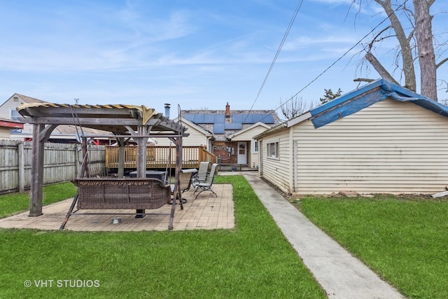 view of yard with a pergola and a patio