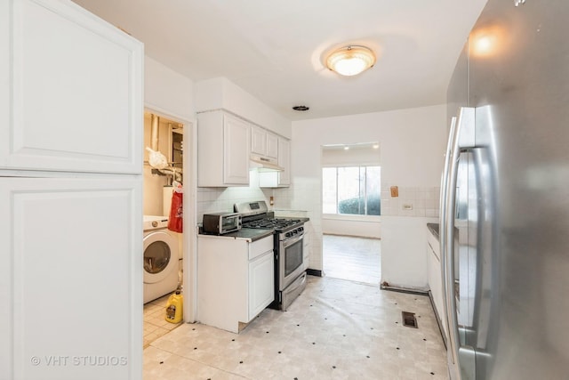 kitchen with white cabinetry, washer / clothes dryer, backsplash, and appliances with stainless steel finishes