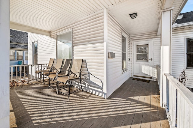 wooden terrace with covered porch