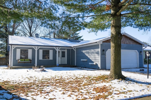 single story home featuring a garage