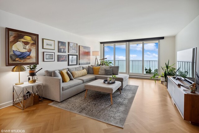 living room with light parquet flooring and expansive windows