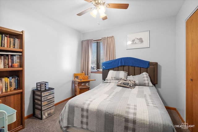 bedroom featuring ceiling fan, a closet, and carpet