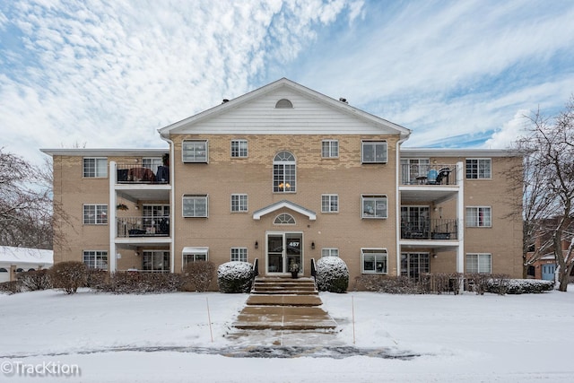 view of snow covered property