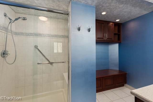 bathroom featuring walk in shower and tile patterned floors