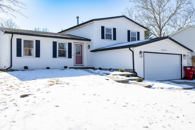 split level home featuring a garage