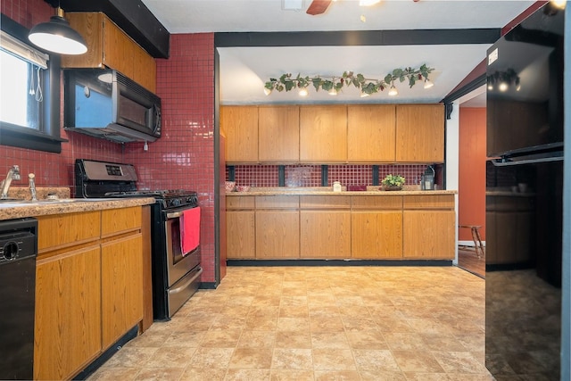 kitchen with tasteful backsplash, sink, and black appliances