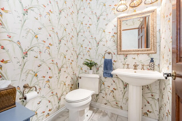 2921 Autumn Dr, Woodridge, IL 60517 - bathroom featuring wallpapered walls and marble finish flooring