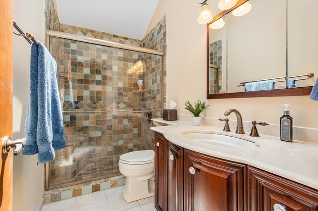 2921 Autumn Dr, Woodridge, IL 60517 - bathroom featuring vanity, a shower stall, tile patterned floors, and lofted ceiling