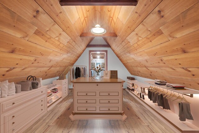 additional living space with wood ceiling, wooden walls, light hardwood / wood-style floors, and lofted ceiling