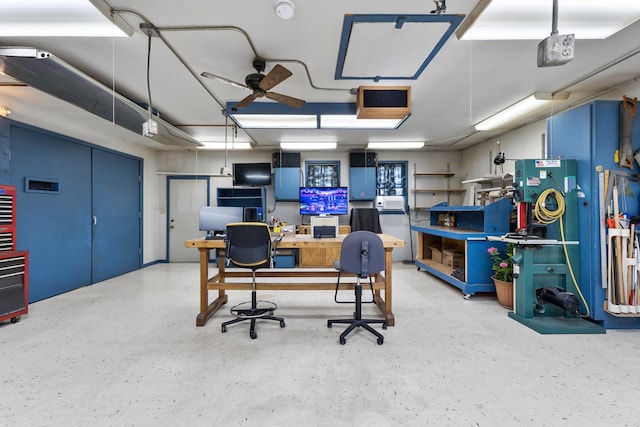 office space featuring a workshop area and ceiling fan