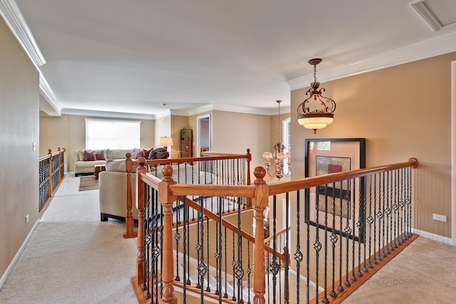 hall featuring light colored carpet and ornamental molding