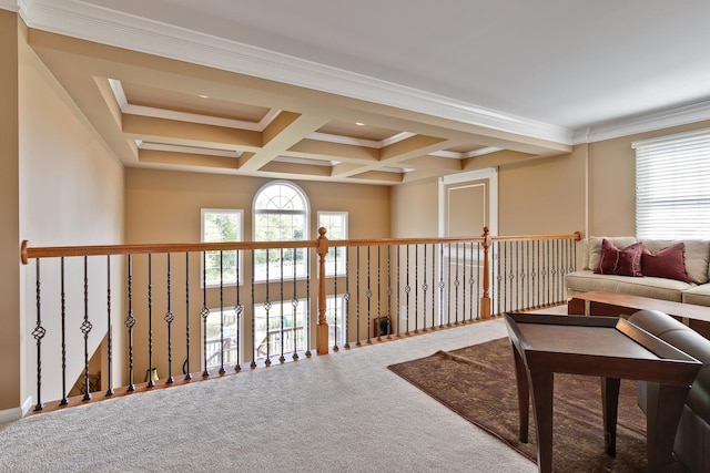 corridor featuring carpet, beam ceiling, crown molding, and coffered ceiling