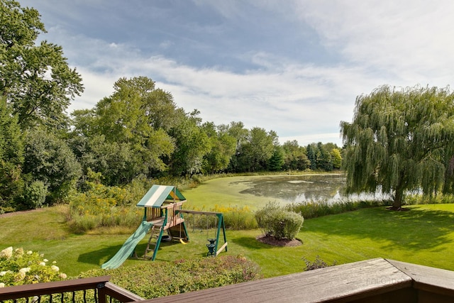 exterior space with a water view and a yard